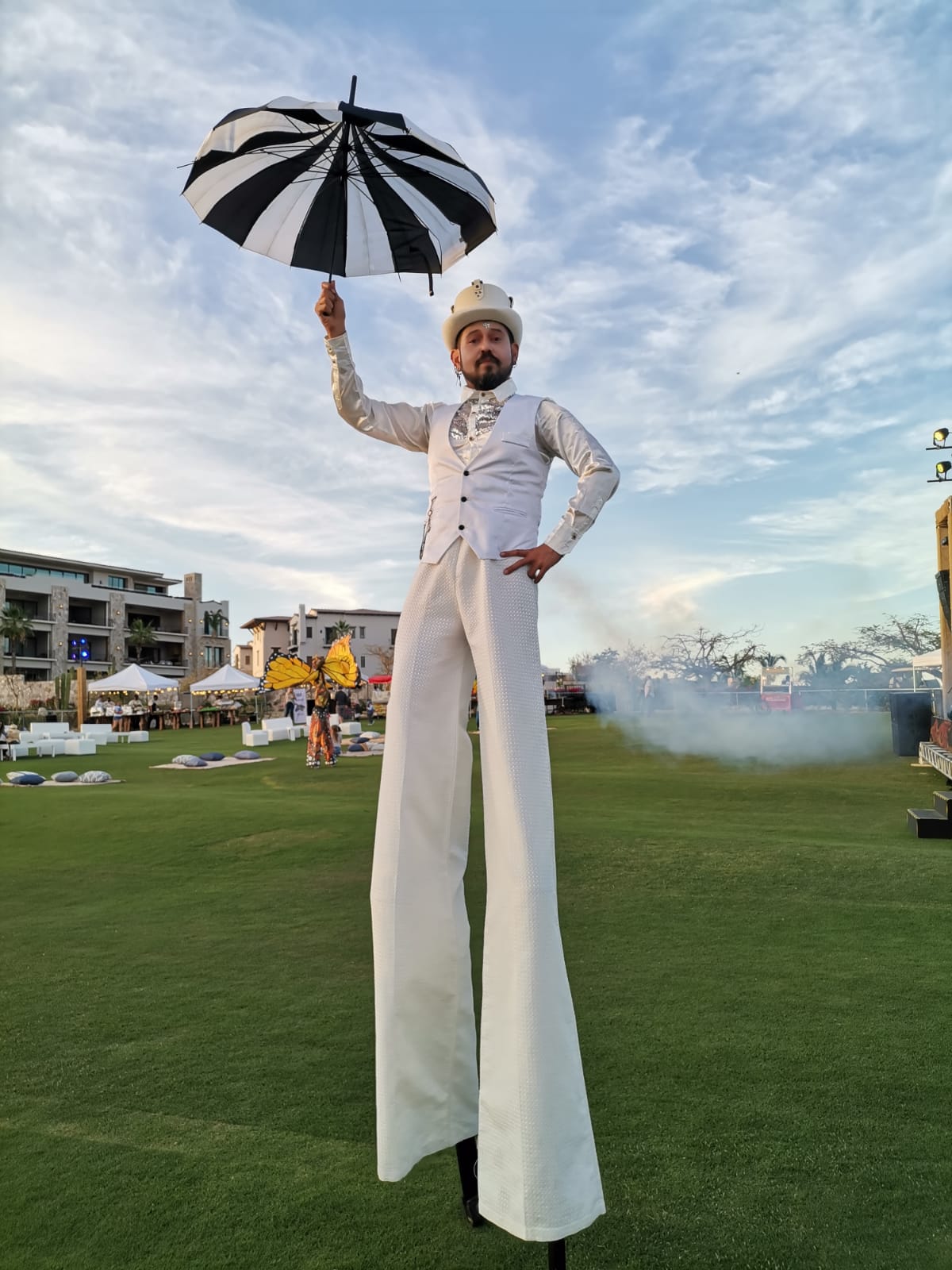 cabo fine entertainment white stilt walker